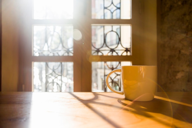 Coffee cup in a table