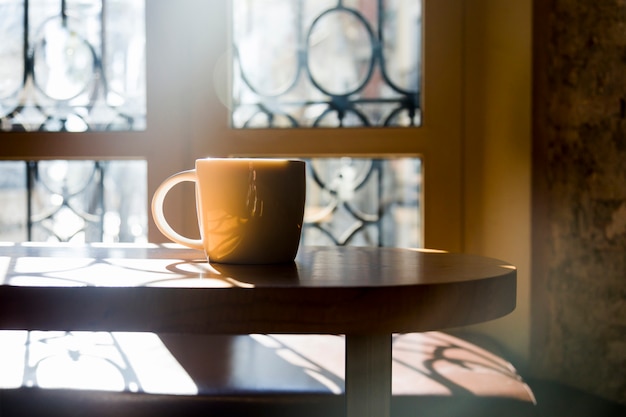 Free photo coffee cup in a table