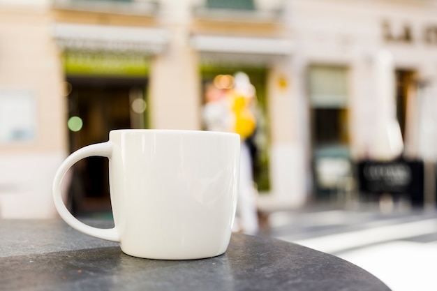 Free Photo coffee cup with blurred background