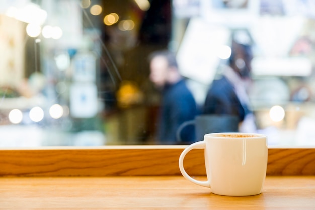 Coffee cup with blurred background