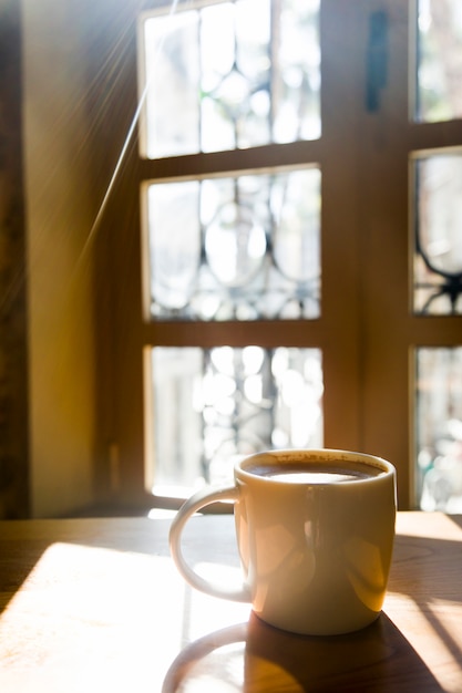 Free photo coffee cup with blurred background