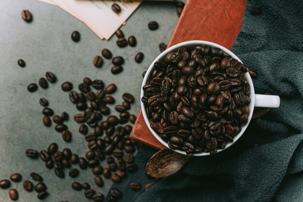 Coffee cups and beans, international coffee day concept