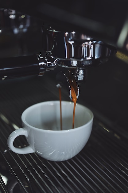 Coffee machine filling a cup