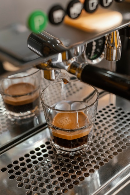 Coffee machine with transparent glass in the coffee shop