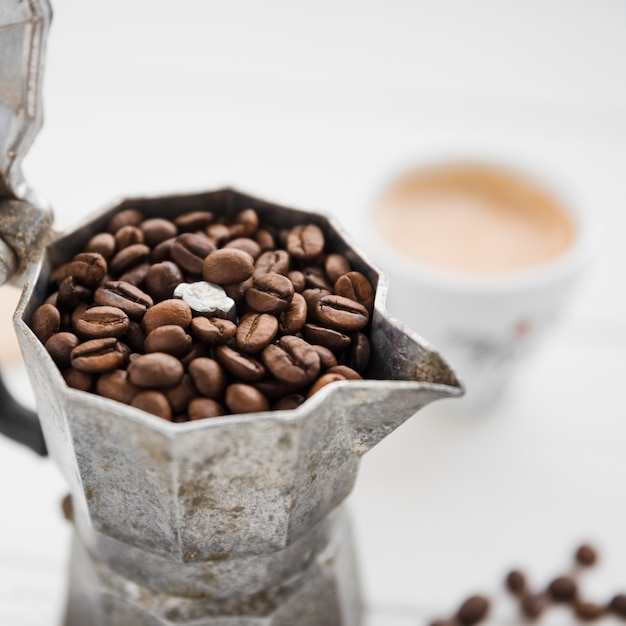 Coffee maker full of coffee grains