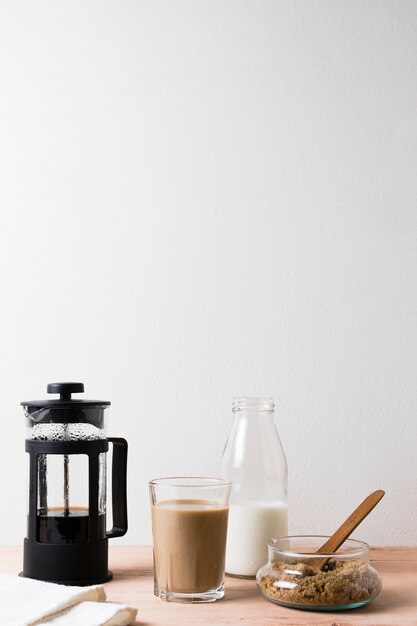 Coffee maker and hot coffee with milk