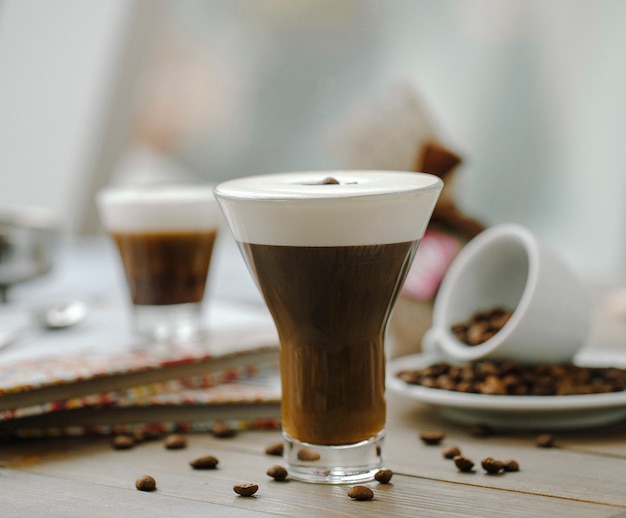 Coffee mocha with cream, garnished with coffee beans