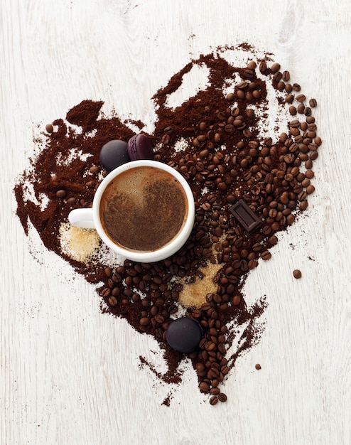 Coffee mug with coffee beans