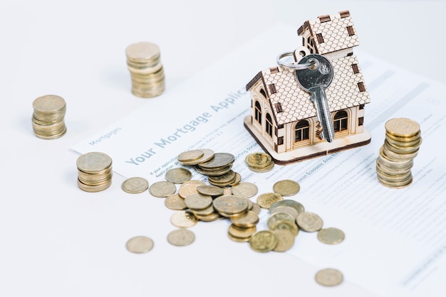 Free photo coins and keys on mortgage application