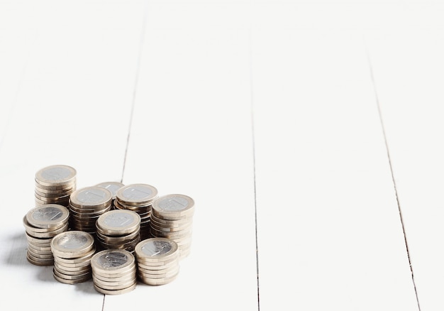 Coins on wooden floor