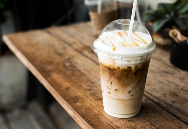 Cold beverage in a plastic cup mockup