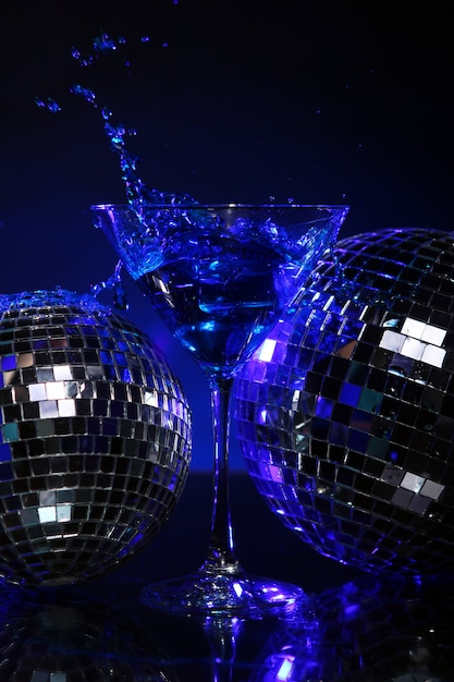 Free photo cold blue cocktail with disco ball