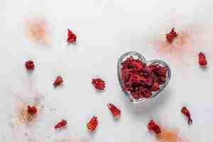 Free photo cold brew hibiscus tea with ice and basil leaves.