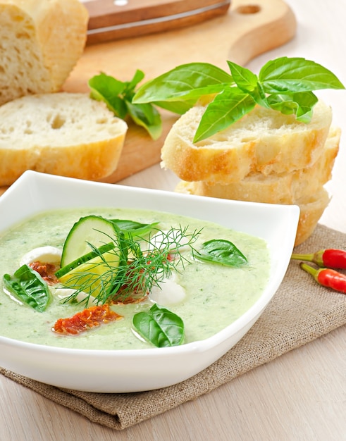 Cold cucumber soup with dried tomatoes and mozzarella