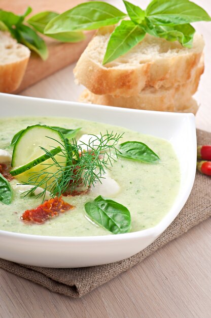 Cold cucumber soup with dried tomatoes and mozzarella