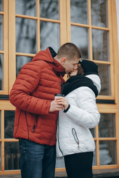 cold day female embracing girl