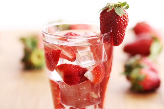 Free photo cold drink with strawberries