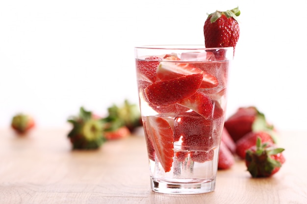 Free photo cold drink with strawberries