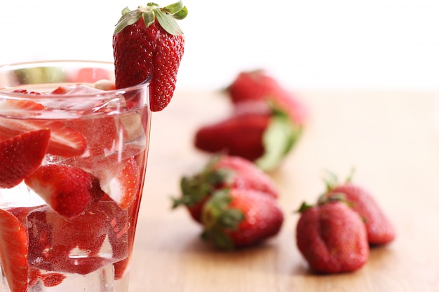 Free photo cold drink with strawberries