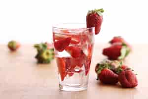 Free photo cold drink with strawberries