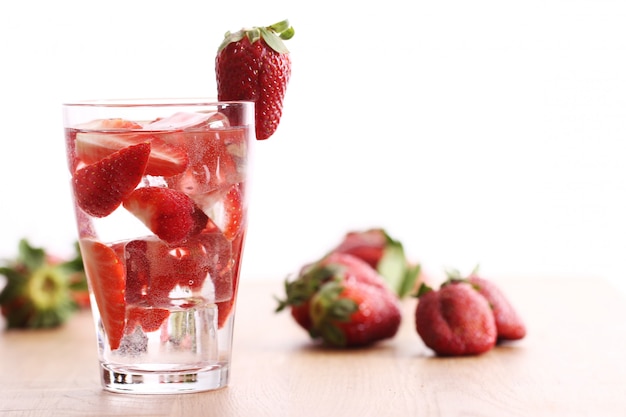 Free photo cold drink with strawberries