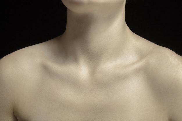 Collarbones. Detailed texture of human skin. Close up shot of young caucasian female body. Skincare, bodycare, healthcare, hygiene and medicine concept. Looks beauty and well-kept. Dermatology.