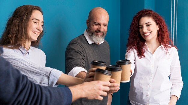 Colleagues enjoying coffee together