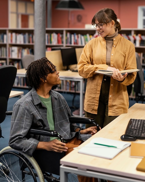 Colleagues studying in the university library