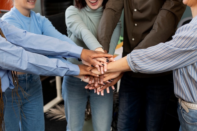 Colleagues working as team at office