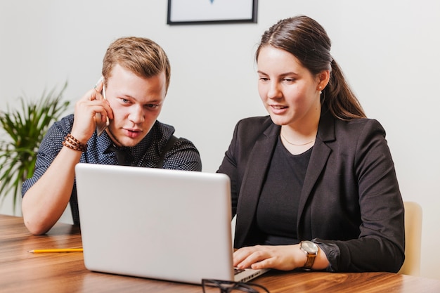 Colleagues working in office