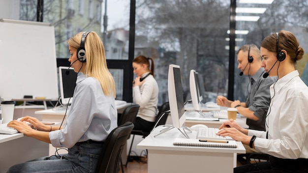 Free Photo colleagues working together in a call center office