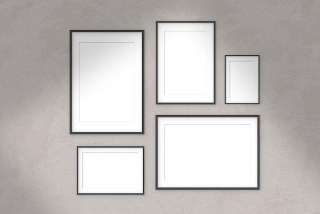 Free photo collection of black frames hanging on a light wall