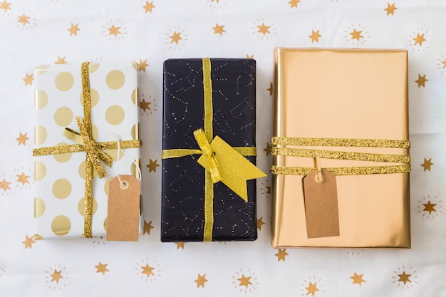 Free photo collection of present boxes in wraps with tags