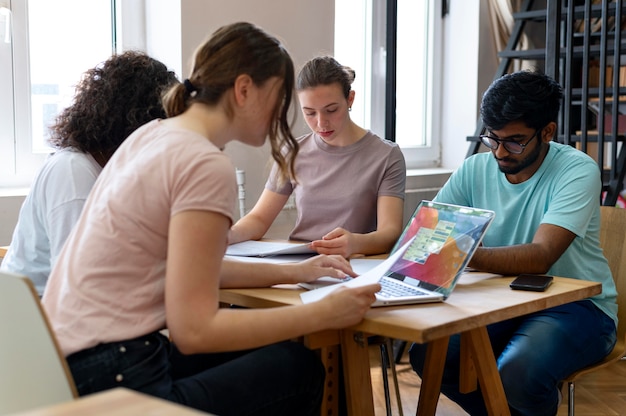 Free photo college mates studying together