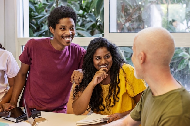 Free Photo college students of different ethnicities cramming