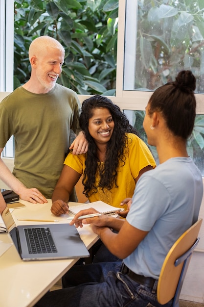 Free Photo college students of different ethnicities cramming