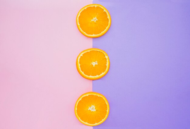 Colored background with orange slices