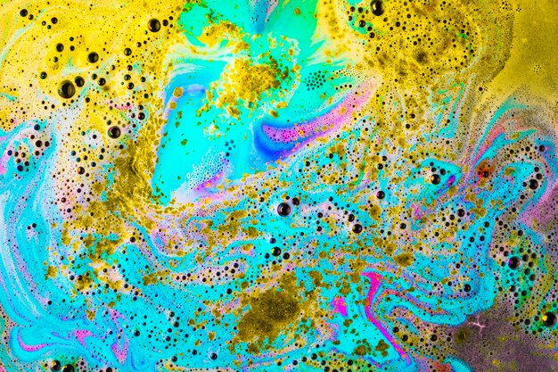 Colored bath bomb surface when dissolve in water