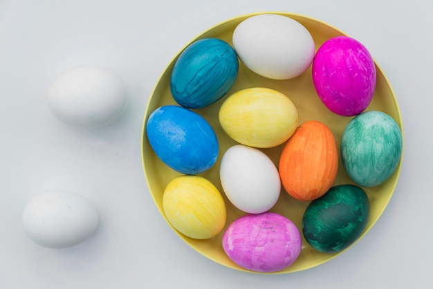 Colored eggs on tray