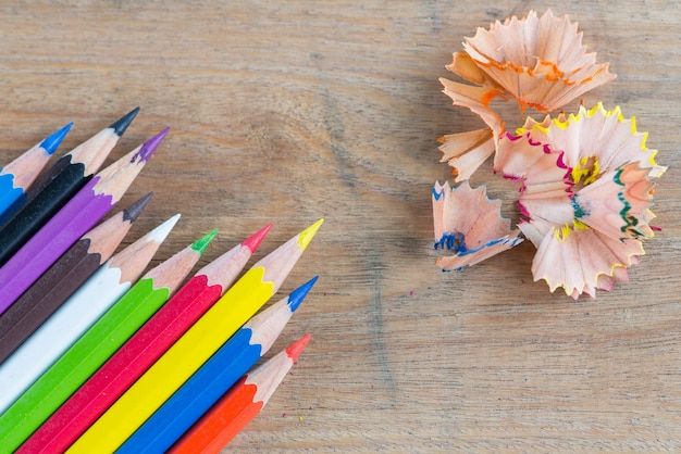 Colored pencils on a wooden