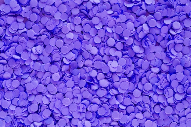 Free photo colored purple confetti from above