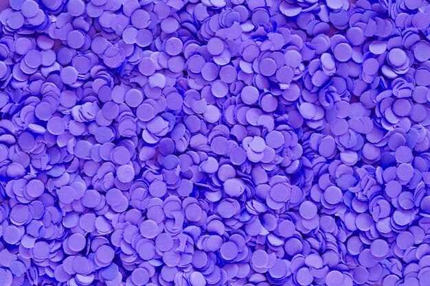 Colored purple confetti from above