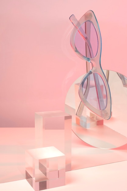 Free photo colored transparent sunglasses  still life