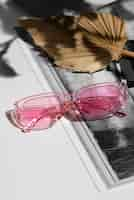 Free photo colored transparent sunglasses  still life