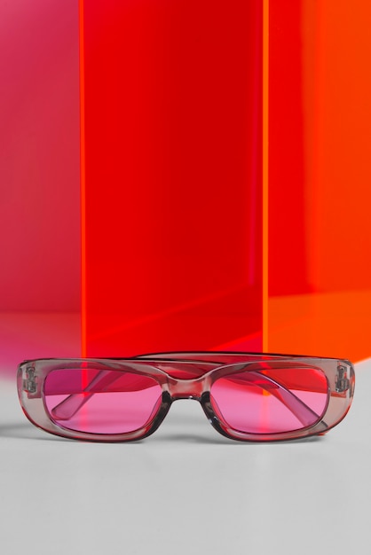 Free photo colored transparent sunglasses  still life