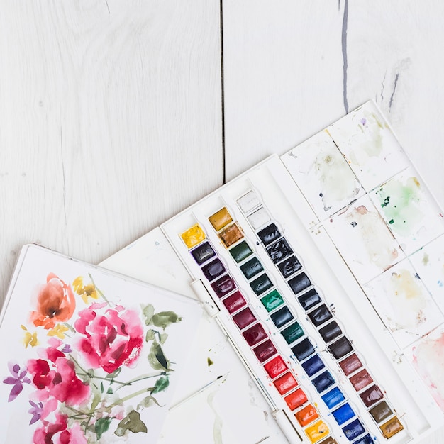 Free photo colorful artist concept with watercolor elements