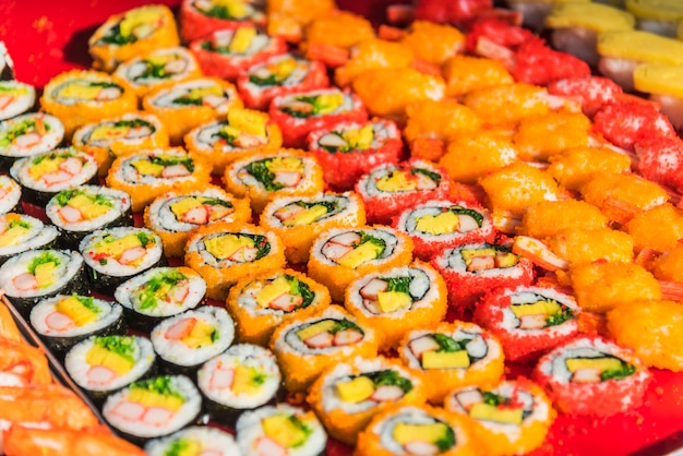 Free photo colorful assortment of sushi rolls