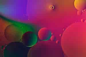 Free photo colorful background oil bubble texture wallpaper