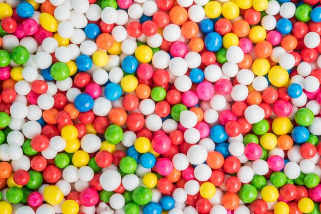 Colorful background texture with sugar candy sprinkles dot