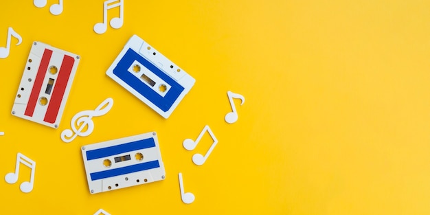 Free photo colorful cassette tapes on bright background with copy-space